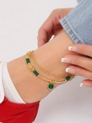 Pierres de Jade Pozłacana bransoletka z kamieniami szlachetnymi na kostkę rozmiar: onesize. Zielone bransoletki damskie Pierres de Jade, pozłacane. Za 80.14 zł.