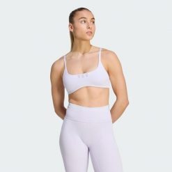 Prążkowany biustonosz All Me z lekkim wsparciem. Czarne biustonosze sportowe damskie Adidas, bez wzorów, z dzianiny. Za 199.00 zł.