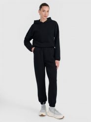 4F Spodnie dresowe z waflowej dzianiny damskie - czarne XS. Czarne spodnie dresowe damskie 4f, xs, bez wzorów, z dresówki. Za 169.99 zł.