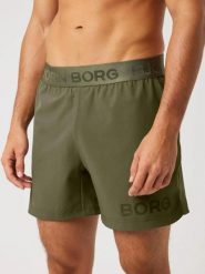 BORG 6" SHORTS z recyklingowanego poliestru – KALAMATA. Zielone szorty męskie Björn Borg, bez wzorów, klasyczne. Za 268.00 zł.