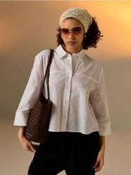 Bawełniana koszula z rękawem 3/4 - biały. Białe koszule damskie Sinsay, l, bez wzorów, z bawełny, bez kołnierzyka, bez ramiączek. Za 49.99 zł.