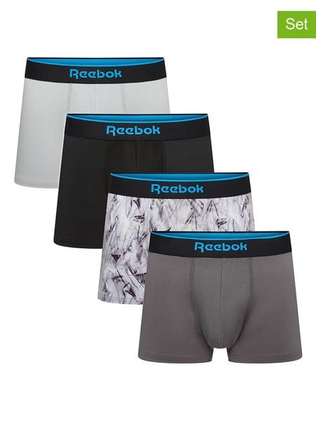 Reebok Bokserki (4 pary) w kolorze białym, czarnym i szarym rozmiar: XL. Białe bokserki męskie Reebok, bez wzorów. Za 85.95 zł.
