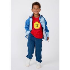 Koszulka Dziecięca LEGO Taj208 Czerwona. Czerwone koszulki dziewczęce LEGO, bez wzorów, bez ramiączek. Za 79.99 zł.