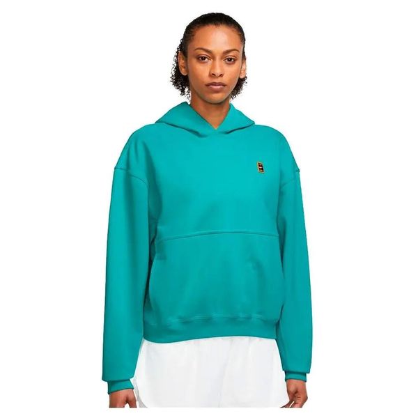 Damska bluza Nike W NKCT DF FLC HERITAGE HOODIE DC3580-392. Zielone bluzy bez kaptura damskie Nike, xs, bez wzorów, z bawełny, bez ramiączek, długie, bez kaptura. Za 169.00 zł.