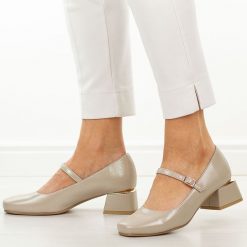 Złote czółenka damskie na obcasie Potocki 12815. Żółte czółenka damskie POTOCKI, bez wzorów, ze skóry, bez obcasa, na obcasie. Za 179.00 zł.