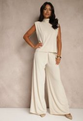 Beżowy Komplet Spodnie o Szerokim Kroju i Bluzka Ozdobiona Wiązaniem Halomia. Brązowe spodnie materiałowe damskie Renee, bez wzorów, eleganckie. Za 189.99 zł.