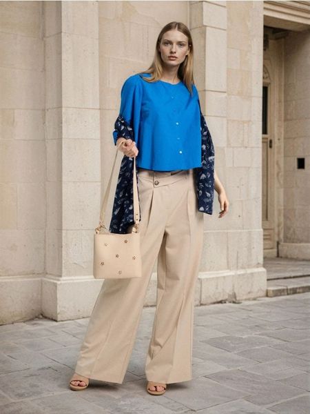 Spodnie culotte - kremowy. Białe spodnie materiałowe damskie Sinsay, bez wzorów. Za 49.99 zł.