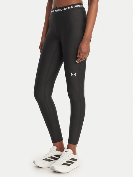 Under Armour Legginsy HeatGear® 6010002 Czarny Slim Fit. Czarne legginsy damskie Under Armour, s, bez wzorów, z syntetyku. Za 189.99 zł.
