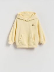Bawełniana bluza z haftem - żółty. Żółte bluzy i bluzki niemowlęce Reserved, bez wzorów, z bawełny, bez ramiączek, bez kaptura. Za 45.99 zł.