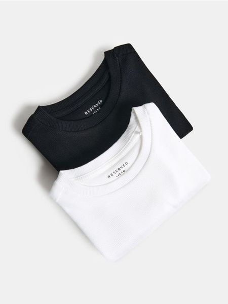 Bawełniany t-shirt 2 pack - wielobarwny. Koszulki dziewczęce Reserved, bez wzorów, z bawełny, bez ramiączek. Za 49.99 zł.