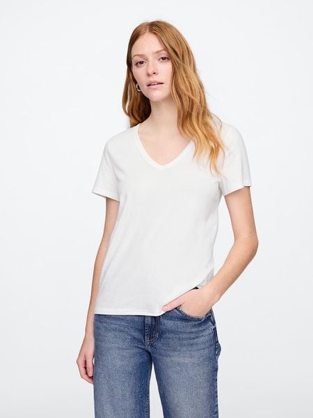 GAP Koszulka w kolorze białym rozmiar: L. Białe t-shirty damskie GAP, l, bez wzorów, z bawełny, bez kołnierzyka. Za 48.05 zł.