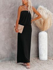 Milan Kiss Sukienka w kolorze czarnym rozmiar: XL. Czarne sukienki damskie Milan Kiss, na imprezę, xl, bez wzorów, bez kołnierzyka, bez ramiączek, maxi. Za 144.58 zł.