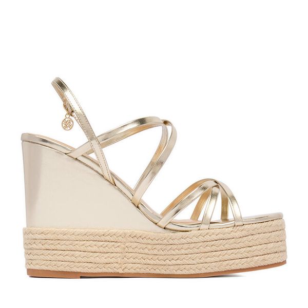 Sandały Nine West. Żółte sandały damskie Nine West, bez wzorów, bez obcasa, na koturnie. Za 229.99 zł.