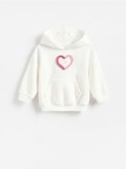 Bluza z kapturem - kremowy. Białe bluzy i bluzki niemowlęce Reserved, bez wzorów, z bawełny, bez ramiączek, z kapturem. Za 55.99 zł.