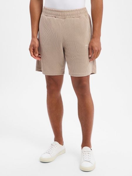 PEGADOR szorty dresowe Mężczyźni Sztuczne włókno beżowy, S. Brązowe szorty męskie PEGADOR, bez wzorów, z dresówki. Za 249.95 zł.