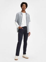 Levi's Spodnie chino "511" - Slim fit - w kolorze granatowym rozmiar: W30/L32. Niebieskie spodnie materiałowe męskie Levi's, z aplikacjami, klasyczne. Za 172.45 zł.