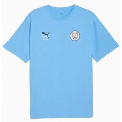 Koszulka Puma Manchester City FC ftblculture męska jasnoniebieska. Niebieskie t-shirty sportowe męskie Puma, m, bez ramiączek, do piłki nożnej. Za 252.99 zł.