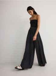 Spodnie palazzo - szary. Szare spodnie materiałowe damskie Reserved, bez wzorów, z tkaniny. W wyprzedaży za 89.99 zł.