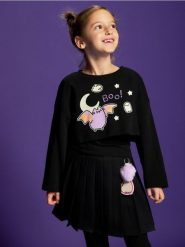 Dwuwarstwowa koszulka Pusheen - czarny. Czarne koszulki dziewczęce Reserved, bez wzorów, z bawełny, bez ramiączek. Za 69.99 zł.