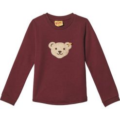 Bluza w kolorze ciemnoczerwonym. Czerwone bluzy chłopięce Steiff, z aplikacjami, bez ramiączek, bez kaptura. W wyprzedaży za 45.95 zł.