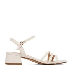 Sandały JENNY. Białe sandały damskie Jenny, bez wzorów, bez obcasa, na słupku. Za 99.99 zł.