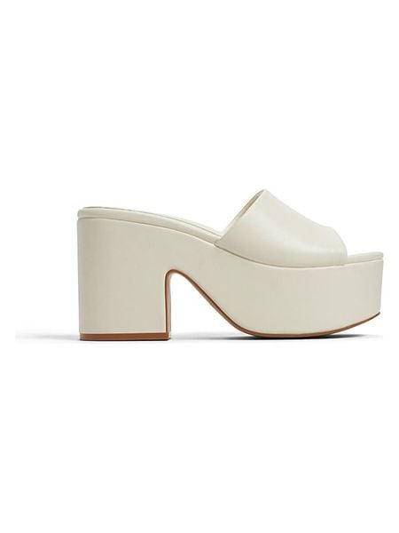 CALL IT SPRING Klapki w kolorze kremowym rozmiar: 39. Brązowe klapki damskie Call It Spring, bez wzorów, bez obcasa. Za 130.99 zł.