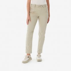 Spodnie turystyczne damskie Quechua NH500 Regular. Brązowe spodnie materiałowe damskie QUECHUA, bez wzorów, z elastanu, sportowe. Za 119.99 zł.