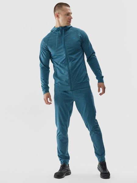 4F Spodnie treningowe szybkoschnące męskie - turkusowe S. Niebieskie spodnie sportowe męskie 4f, z dzianiny. W wyprzedaży za 99.99 zł.