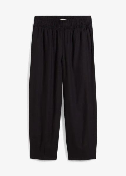 Spodnie 7/8 z gumką w talii z mieszanki lnu i wiskozy. Czarne spodnie materiałowe damskie bonprix, bez wzorów, z wiskozy. Za 159.99 zł.