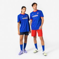 Koszulka piłkarska Słowacja 2026 dla kibiców. Czerwone t-shirty damskie KIPSTA, s, z materiału, bez ramiączek, do piłki nożnej. Za 44.99 zł.