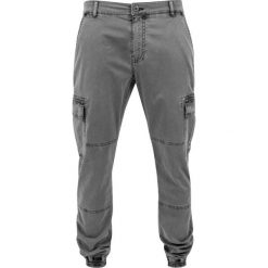 Spodnie Urban Classics cargo z kantem. Czarne spodnie materiałowe męskie Urban Classics, bez wzorów, z materiału. Za 198.75 zł.