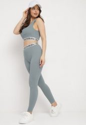 Ciemnozielone Elastyczne Legginsy z Szeroką Gumą w Pasie Rindama. Zielone legginsy damskie Born2be, l, bez wzorów, z gumy. Za 19.99 zł.