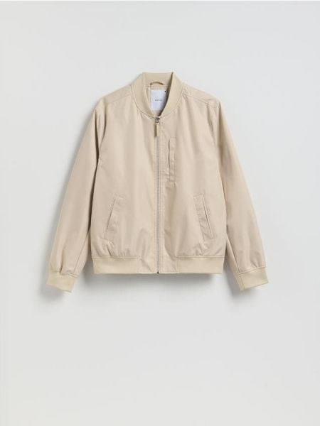 Kurtka bomberka ze stójką - beżowy. Brązowe kurtki męskie Reserved, l, bez wzorów, bez kaptura. Za 199.99 zł.