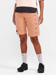 Craft Szorty kolarskie 3w1 "ADV Offroad" w kolorze pomarańczowym rozmiar: XL. Pomarańczowe spodenki sportowe damskie Craft, xl, z materiału, rowerowe. Za 260.99 zł.