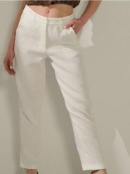 Klasyczne spodnie z wiskozą - kremowy. Białe spodnie materiałowe damskie Sinsay, bez wzorów, z wiskozy, klasyczne. Za 49.99 zł.