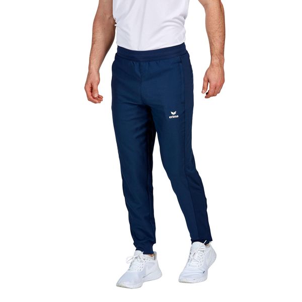Spodnie do biegania Erima Change. Niebieskie szorty męskie Erima, bez wzorów, sportowe. Za 208.50 zł.