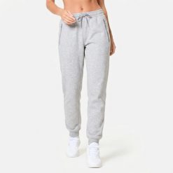 Spodnie dresowe fitness damskie Domyos slim. Szare spodnie sportowe damskie DOMYOS, l, z dresówki, na fitness i siłownię. Za 99.99 zł.