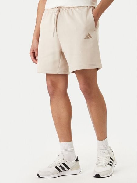 Adidas Szorty sportowe Future Icons Small Logo KD7659 Beżowy Regular Fit. Brązowe szorty męskie Adidas, bez wzorów, z bawełny, sportowe. Za 161.99 zł.
