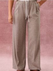 Spodnie wide leg z wiązaniem - beżowy. Brązowe spodnie materiałowe damskie Sinsay, bez wzorów. Za 49.99 zł.