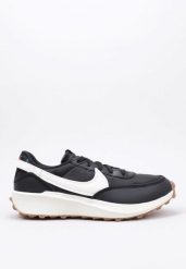 Tenisówki Nike Model Waffle Debut Premium Kolor Czarny. Czarne trampki i tenisówki męskie Nike, bez wzorów, z materiału, bez zapięcia. Za 435.50 zł.