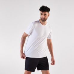 Koszulka do biegania męska Kiprun Run 100. Białe t-shirty sportowe męskie KIPRUN, m, z materiału, bez ramiączek, do biegania. Za 29.99 zł.