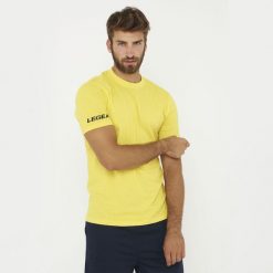 Koszulka bawełniana ARIA żółta. Żółte bluzki sportowe damskie Legea, z bawełny, bez kołnierzyka, bez ramiączek. Za 52.00 zł.