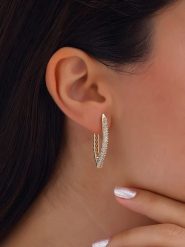 Nakkash Pozłacane kolczyki z cyrkoniami rozmiar: onesize. Żółte kolczyki damskie Nakkash, z cyrkonią, pozłacane. Za 82.83 zł.