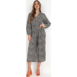 Czarny Kombinezon Pyrhele. Czarne kombinezony damskie Born2be, l, bez wzorów, eleganckie, bez kołnierzyka, bez ramiączek, długie. Za 49.99 zł.