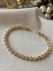 Luseera Pozłacana bransoletka z cyrkoniami rozmiar: onesize. Żółte bransoletki damskie Luseera, pozłacane. Za 43.99 zł.