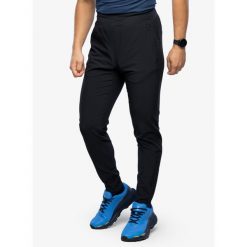 Spodnie męskie Under Armour OutRun The Storm Pants. Czarne spodnie materiałowe męskie Under Armour, bez wzorów, sportowe. Za 249.99 zł.