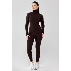 Damska bielizna termoaktywna z golfem Rough Radical Powder. Brązowa bielizna termoaktywna damska ROUGH RADICAL, bez wzorów. Za 229.00 zł.