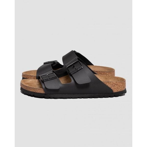 Klapki Birkenstock Arizona Nero Dorosłych. Brązowe klapki damskie Birkenstock, bez wzorów, z materiału, bez obcasa. Za 407.30 zł.