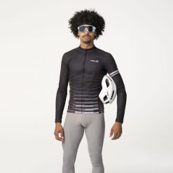 Męska koszulka rowerowa z długim rękawem Essential czarna. Czarne t-shirty sportowe męskie Agu, na jesień, m, z materiału, bez ramiączek. Za 430.10 zł.