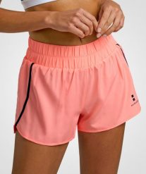 Spodenki damskie Tenis/Padel Training. Czerwone szorty damskie NORDICDOTS, bez wzorów, z materiału, klasyczne, z standardowym stanem. Za 190.00 zł.